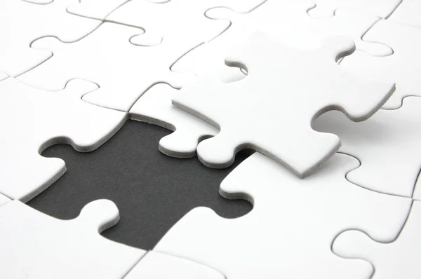Jigsaw ou quebra-cabeça — Fotografia de Stock