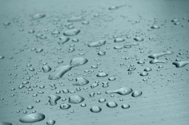 Water drops on metal surface clipart