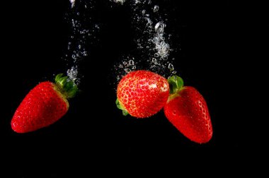 Strawberry in water clipart