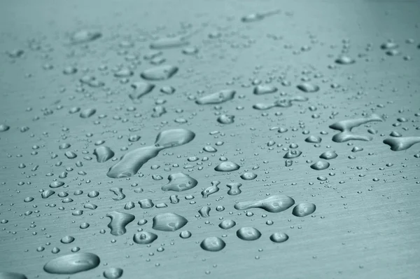 Water drops on metal surface — Stock Photo, Image