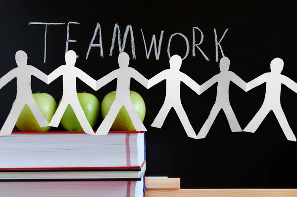 Teamwork and chalkboard — Stock Photo, Image