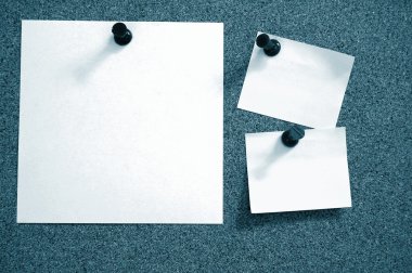 Blank sheet paper on bulletin board clipart