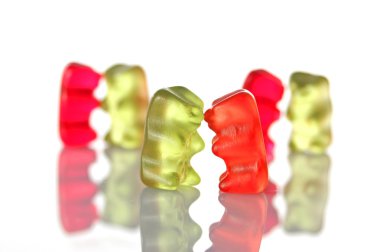 Gummy bears dancing at a party clipart