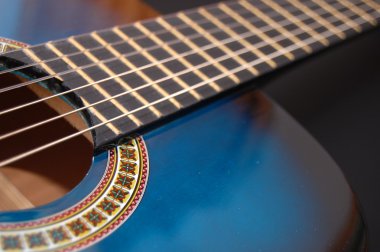 Blue music guitar for playing party music clipart