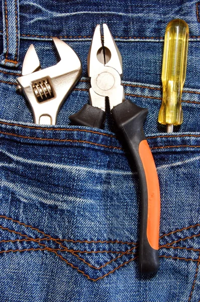 Narzędzia i dżinsy — Zdjęcie stockowe