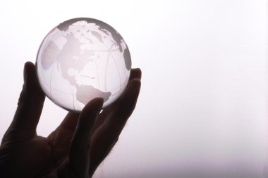 Globe in hand clipart