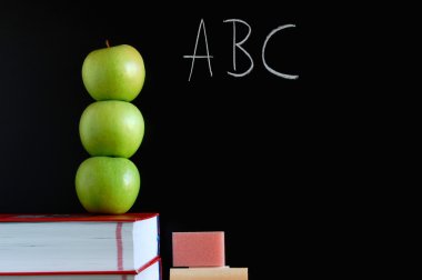 Blackboard and apples clipart