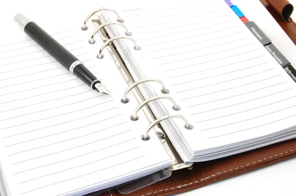 Business organizer and pen — Stock Photo, Image