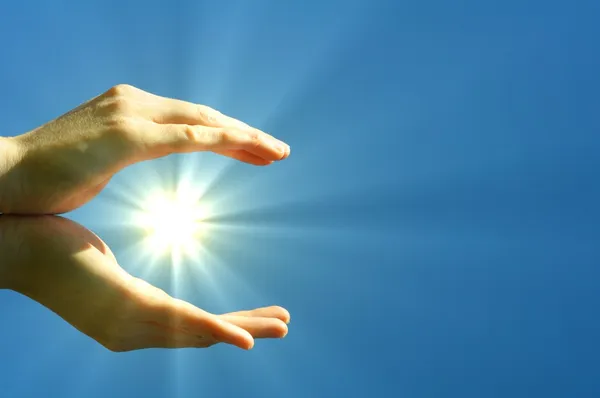 Hand sun and blue sky — Stock Photo, Image
