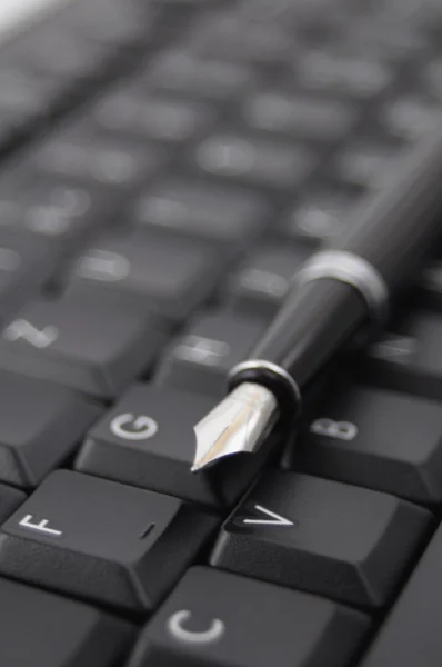 Pen and keyboard Stock Picture