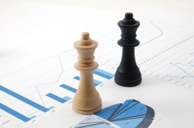 Chess man over business chart clipart