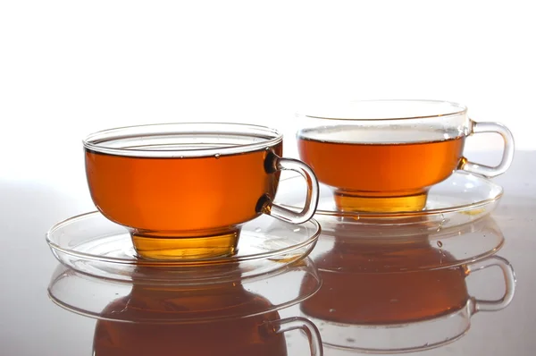 Cup of tea on white with reflection — Stock Photo, Image