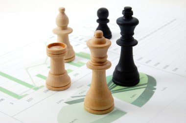 Chess man over business chart clipart