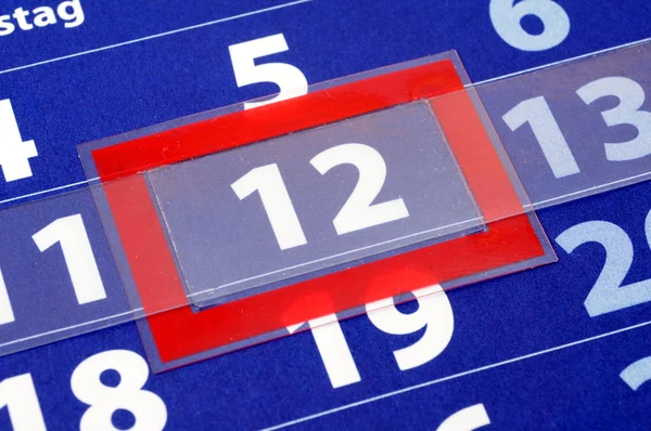 Röda och blå kalender — Stockfoto
