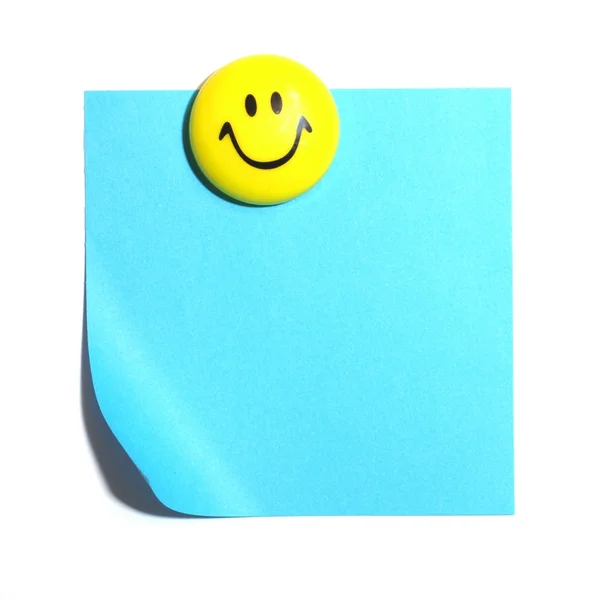 Smiley ansikte och blankt papper — Stockfoto