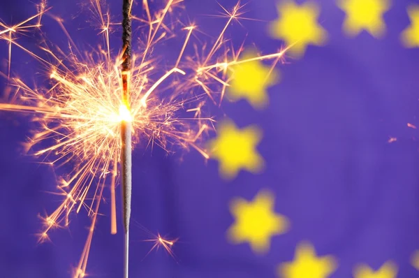 Euro union flag and sparkler — Stock Photo, Image