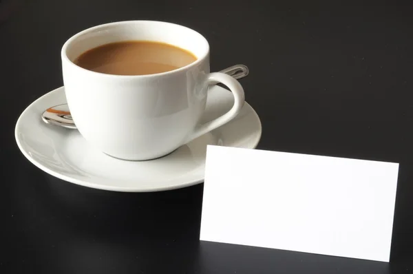 Cup of coffee and paper copyspace — Stock Photo, Image