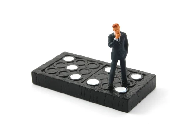 Business man on domino isolated — Stock Photo, Image