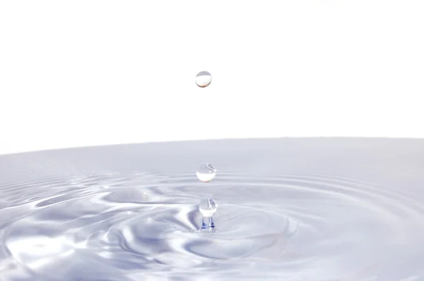 Gota de agua aislada en blanco —  Fotos de Stock