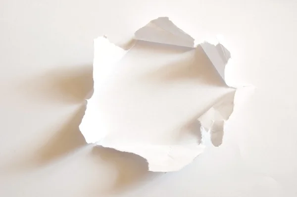 Hole in paper — Stock Photo, Image
