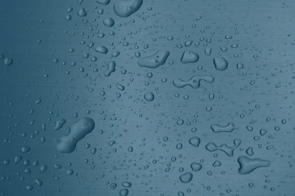 Gotas de agua en superficie metálica —  Fotos de Stock