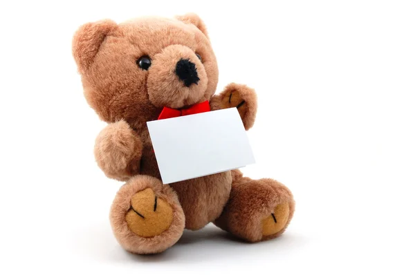 Isolated teddy with blank sheet — Stock Photo, Image