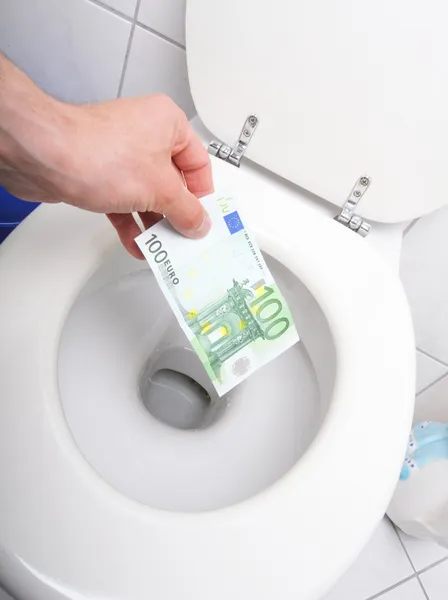 Pengar och toalett — Stockfoto