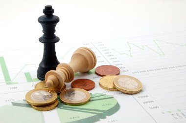 Chess man over business chart clipart