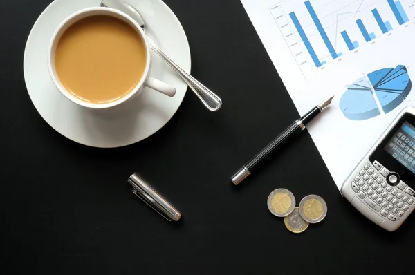 Coffee and financial data — Stock Photo, Image