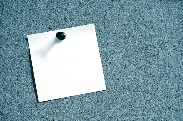 Blank sheet paper on bulletin board — Stock Photo, Image