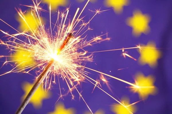 Euro union flag and sparkler — Stock Photo, Image