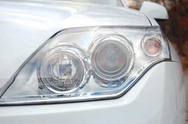 Headlight of a car clipart