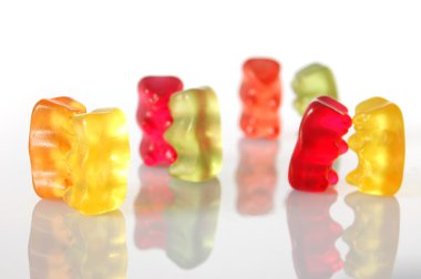 Gummy bears dancing at a party clipart