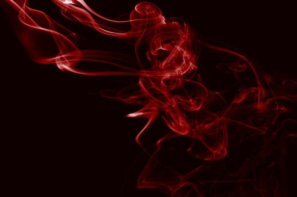 Abstract smoke background with colorful smoke on black