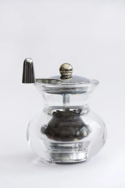 Glass pepper grinder — Stock Photo, Image