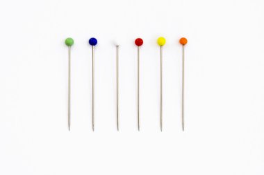 A line of sewing pins clipart