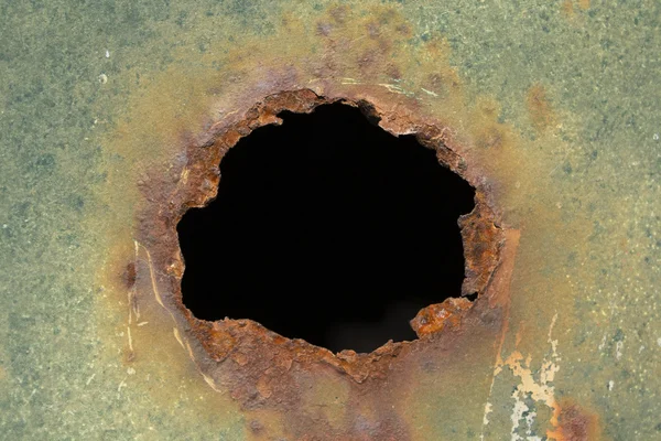 Rusted hole — Stock Photo, Image