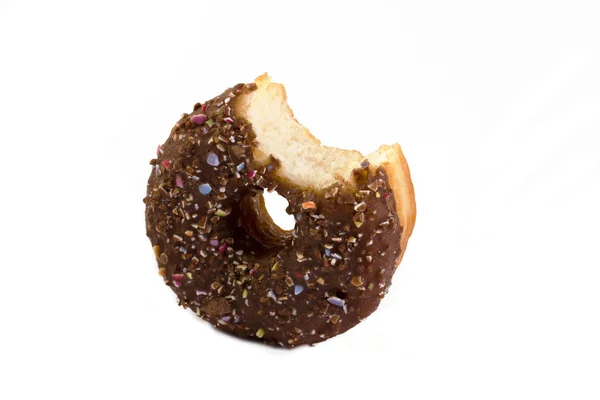 Donut mit Biss über Weiß übernommen — Stockfoto