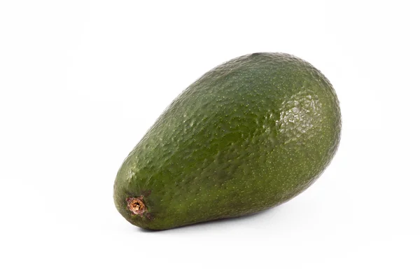 Einzelne Avocado isoliert auf weiß — Stockfoto