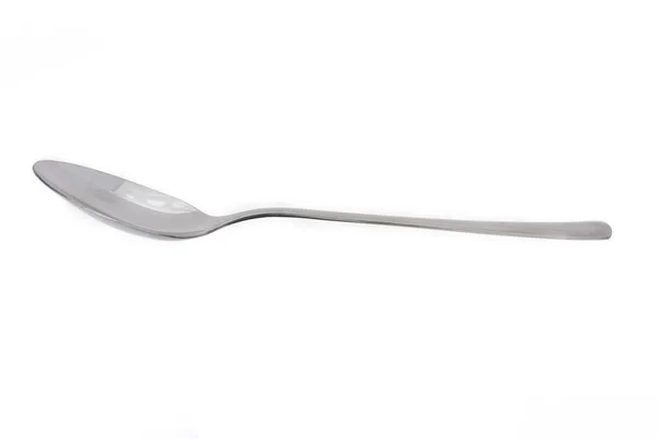 Single spoon over white — Stock Photo, Image