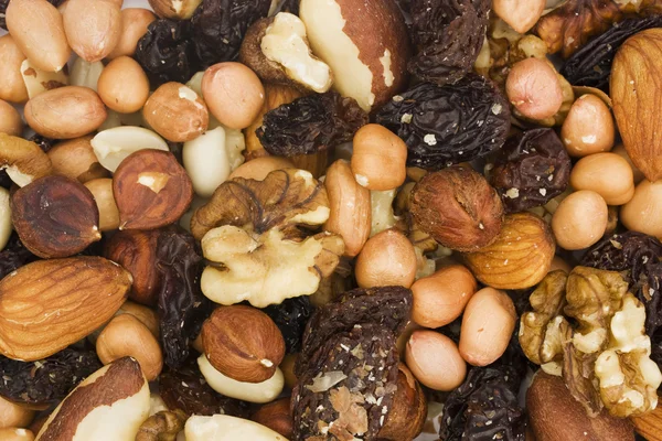 Achtergrond van gemengde noten en gedroogde vruchten — Stockfoto