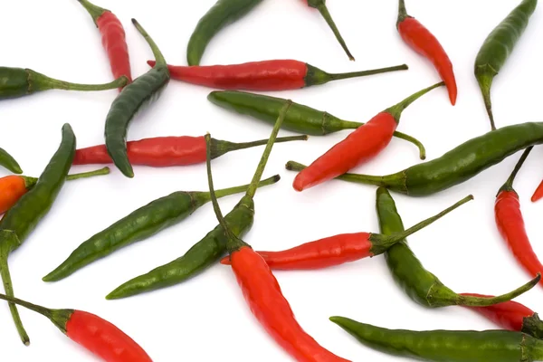 Červené a zelené chilli pozadí — Stock fotografie