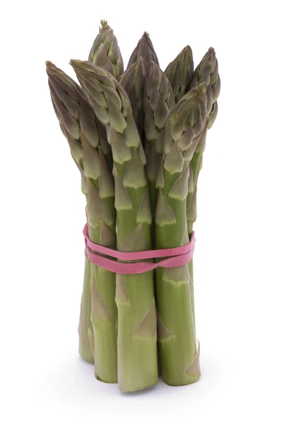 stock image Bunch of asparagus spears on white