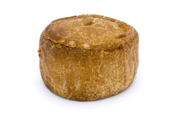 Small pork pie isolated on white — Stock Photo, Image