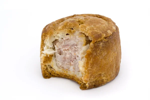 Small pork pie with bite taken — Stock Photo, Image