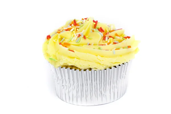 Κίτρινο cupcake πάνω από λευκό — Φωτογραφία Αρχείου