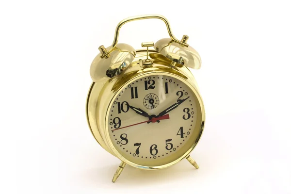 Gold alarm clock over white — Stock Photo, Image