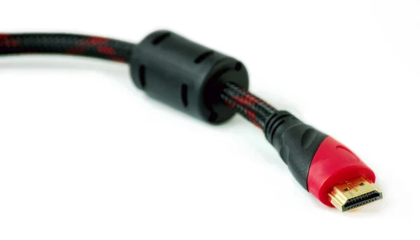 HDMI-kabeln med ferritkärna isolerade Royaltyfria Stockfoton