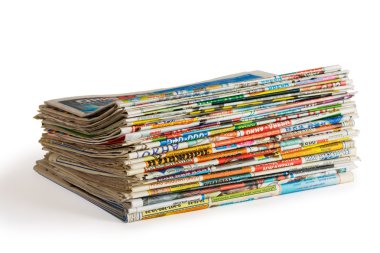 A pile of newspapers isolated