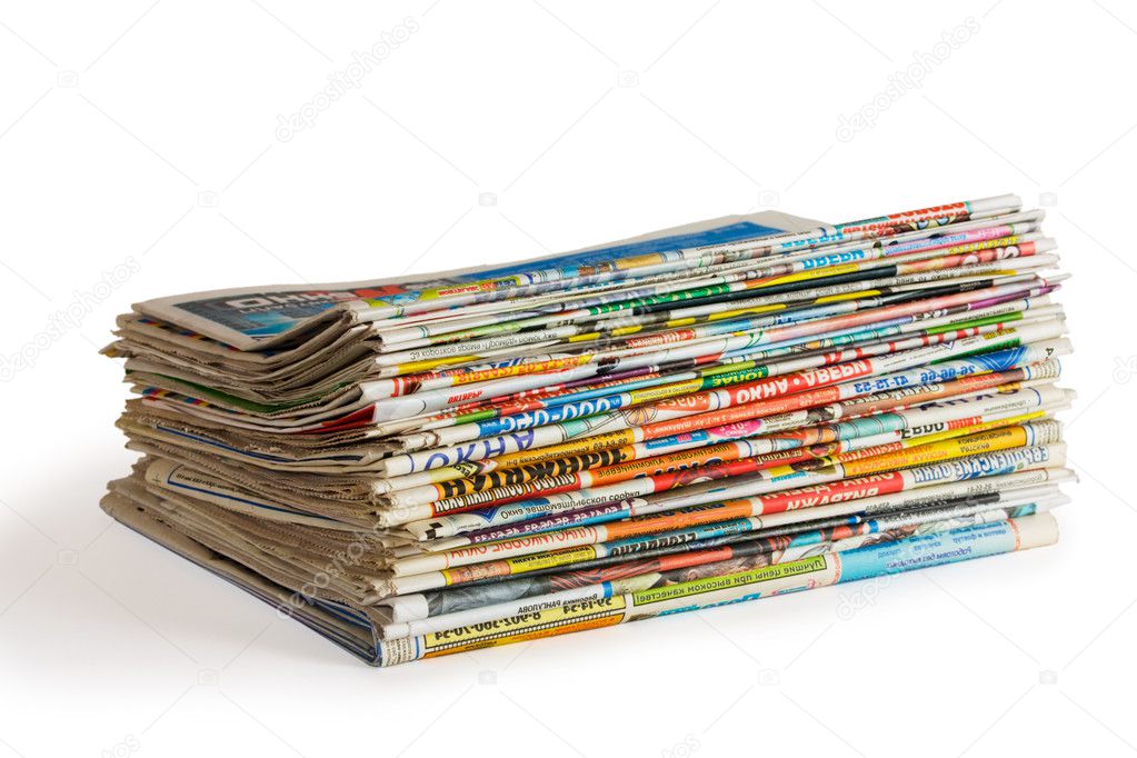 A pile of newspapers isolated